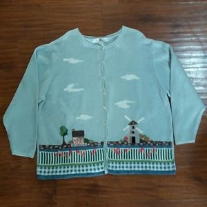 Blue cardigan sweater with cloud/home detail